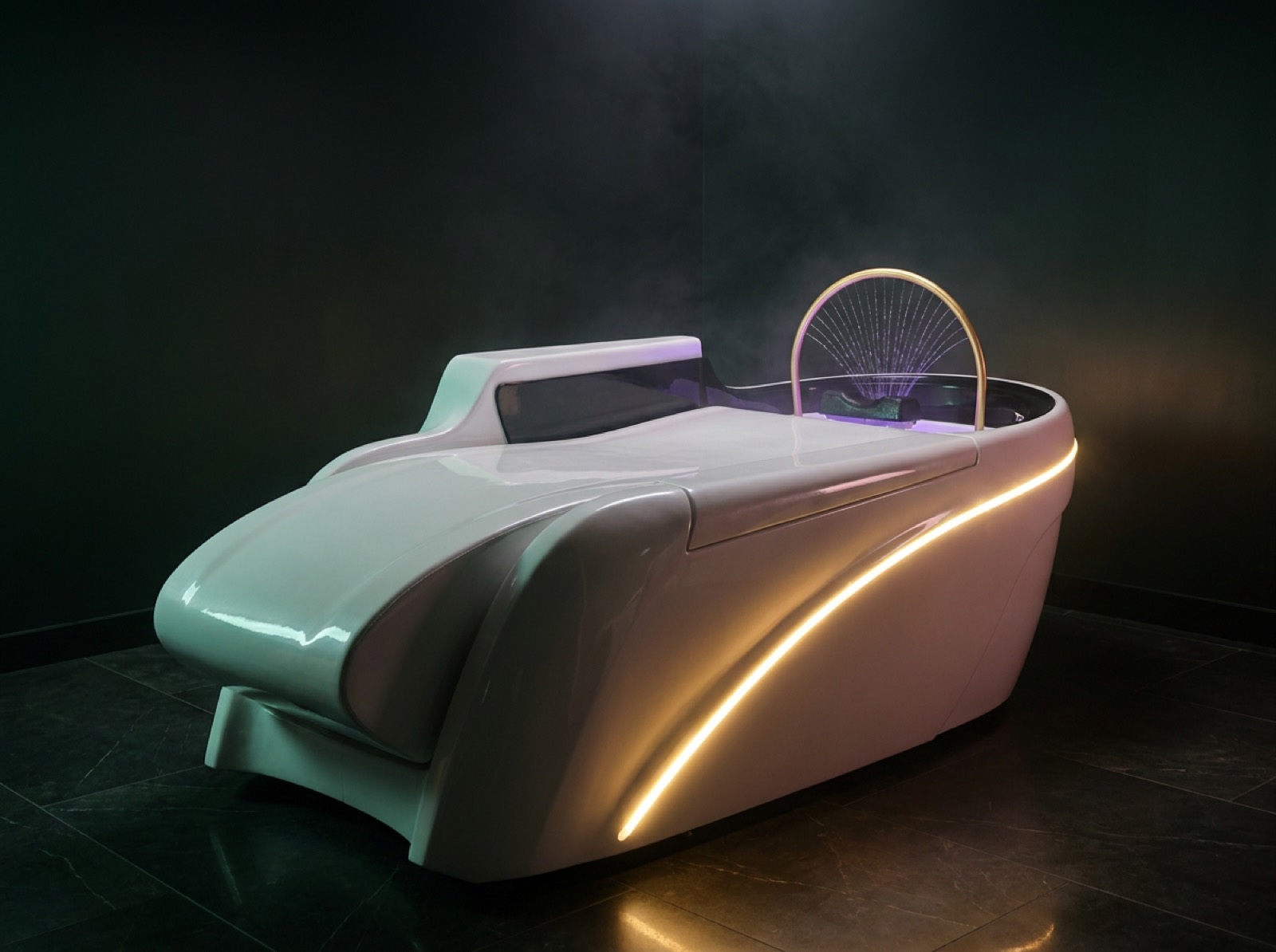 The Kolibri HeadSpa station with golden halo shower